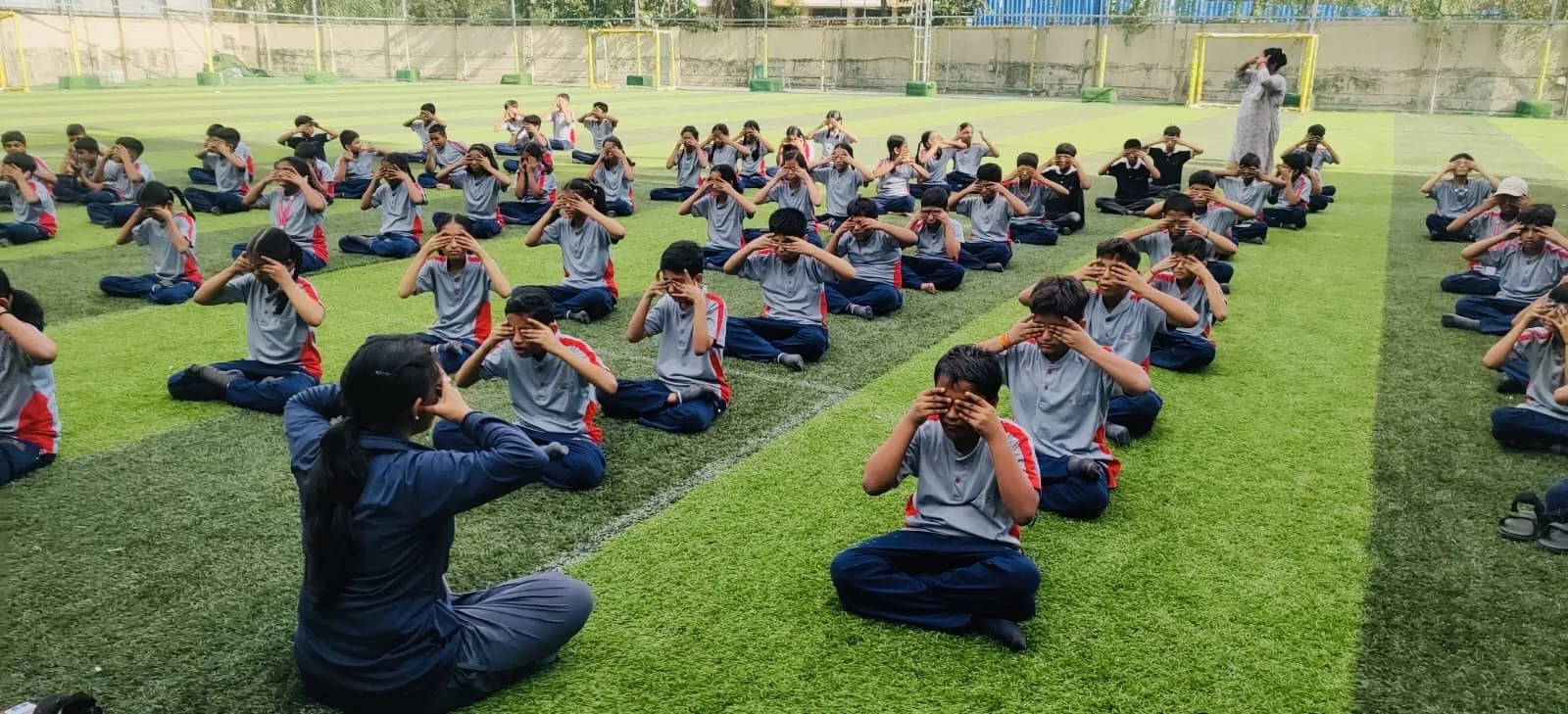 Outdoor meditation on the sports turf