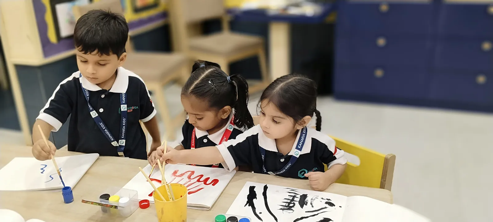 Young learners painting